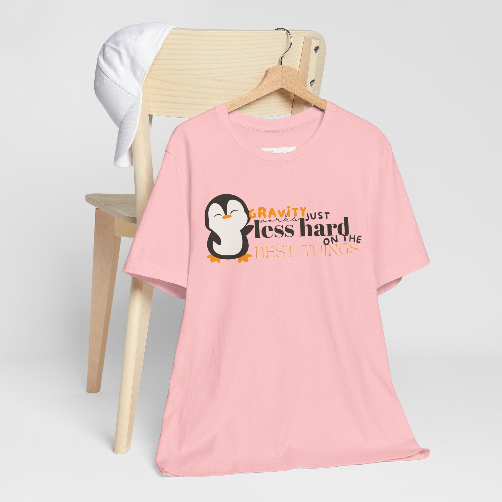 Gravity Just Works Less Hard on the Best Things Penguin G... | T-Shirt | Al Mery's Paradise